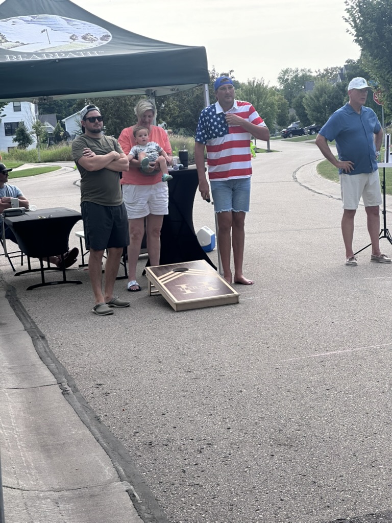 Burnside Way FM and spectators beside the court