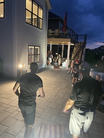 Players and spectators gathered around the final nighttime matches