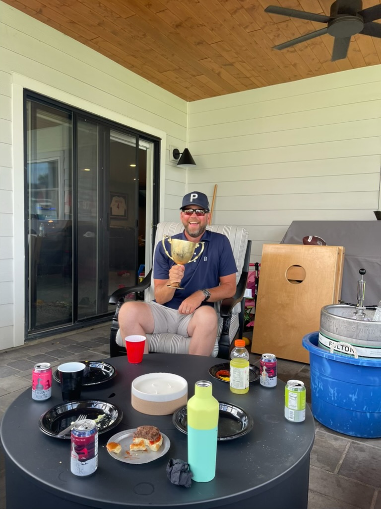 2022 Burnside Way Golf Champion holding The Chalice